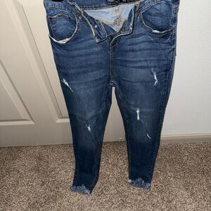 Distressed Blue Jeans